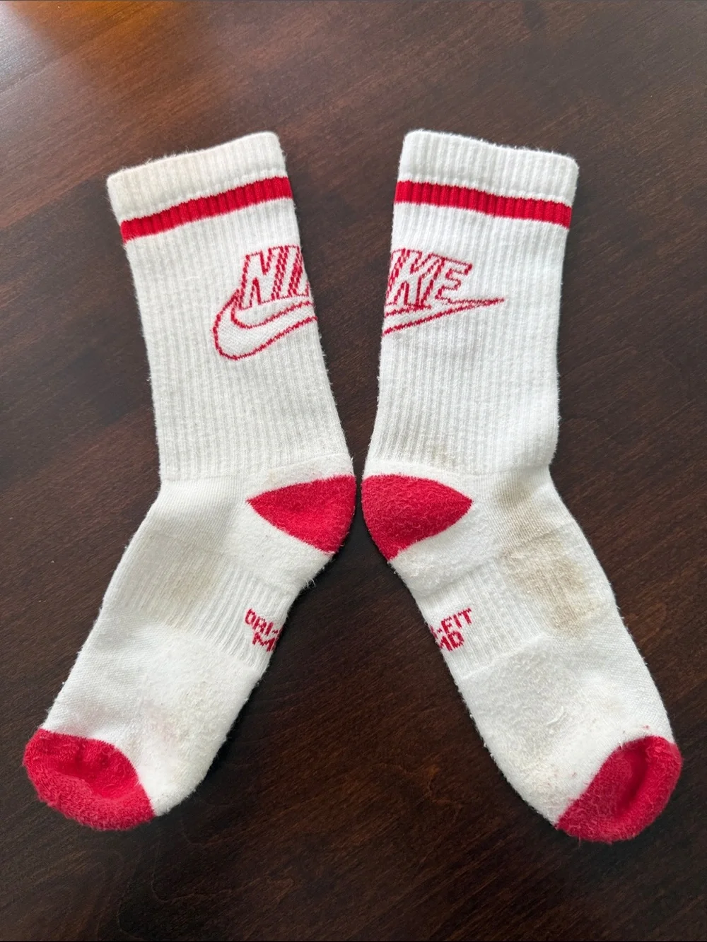 4 pairs Nike White Crew Athletic Socks with Red and Blue Accents heel to toe 8”.